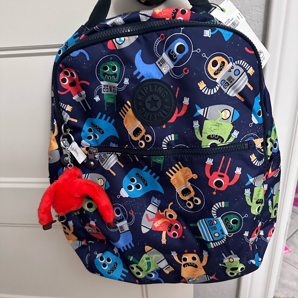 Kipling New with tags snd bag. School back pack